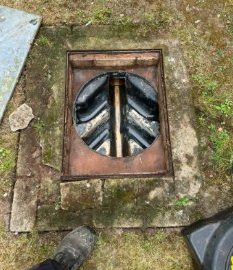 Cleared drain chamber with the cover lifted